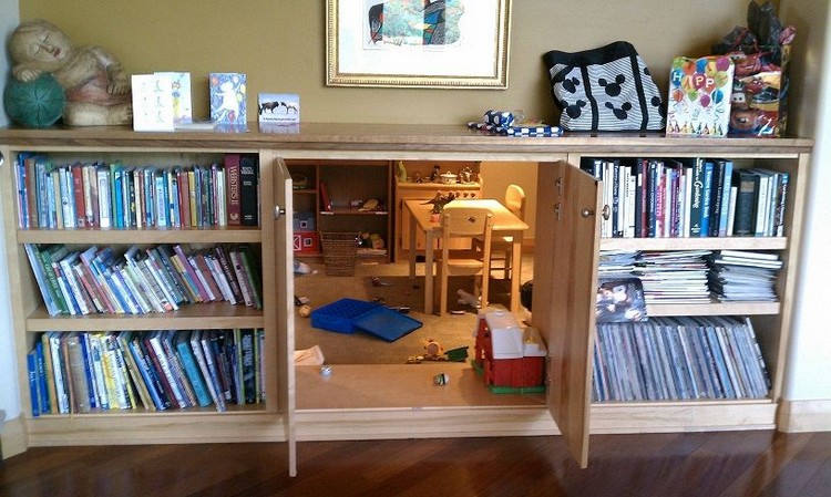 Secret Playroom Built into a Cabinet in a Bookshelf